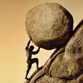 Some dude pushing a rock